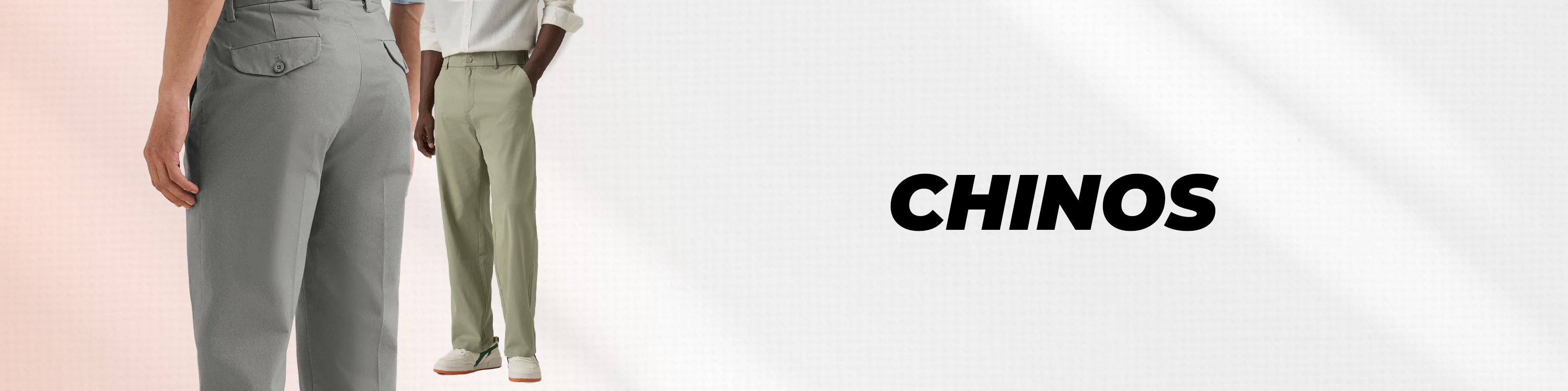 Two models shown from the waist down wearing light-colored trousers, with the word 'CHINOS' printed in bold black text on the right side against a white background.