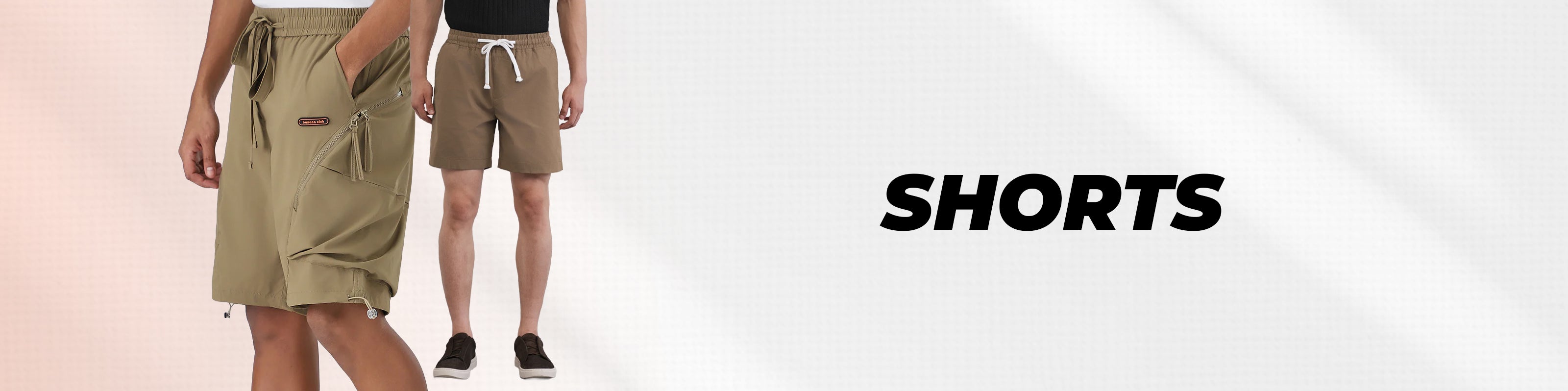 Two models wearing khaki cargo shorts shown from the waist down against a light gray background with the word 'SHORTS' in bold black text.
