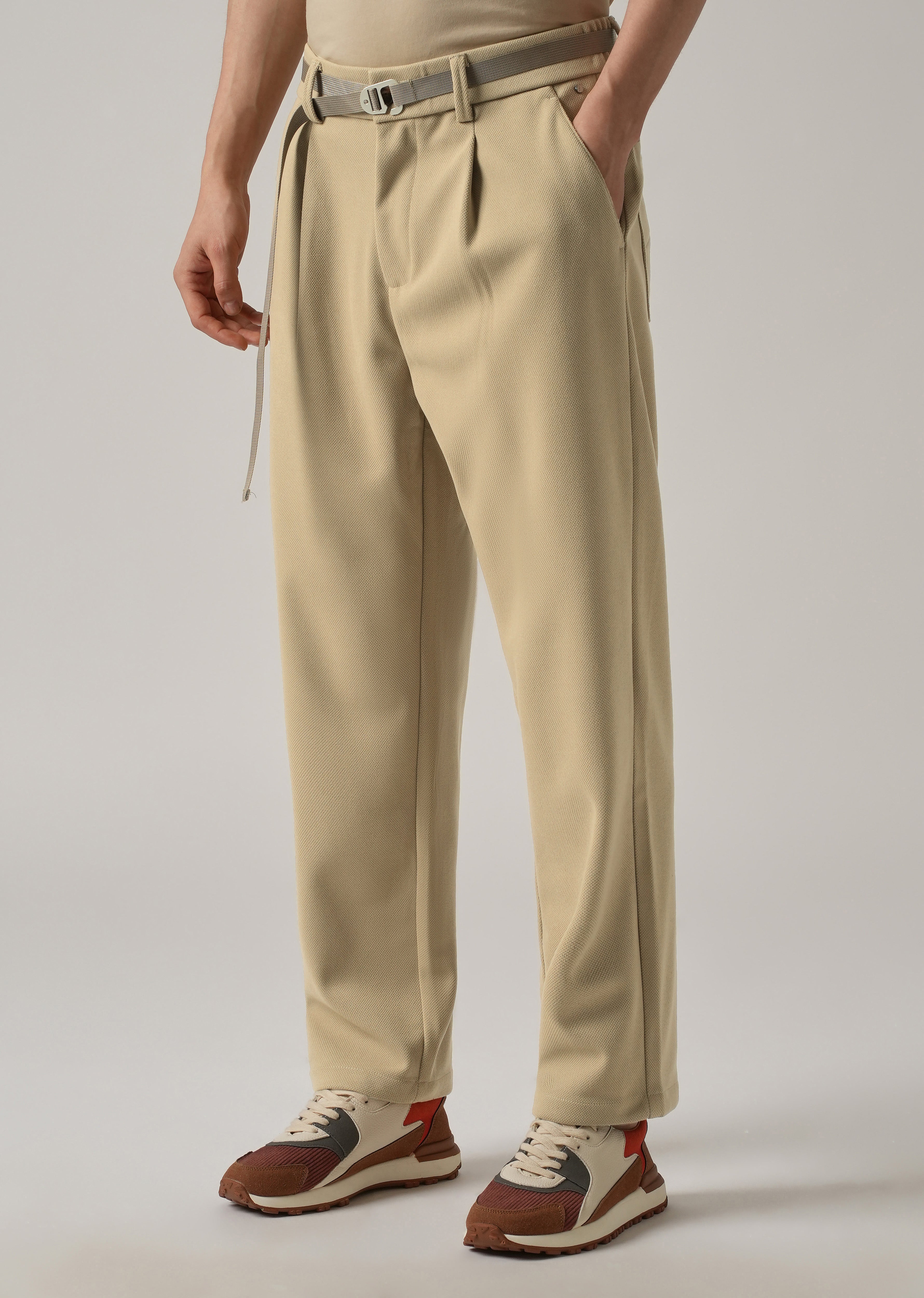 Beige Relaxed Fit Textured Pleated Pant