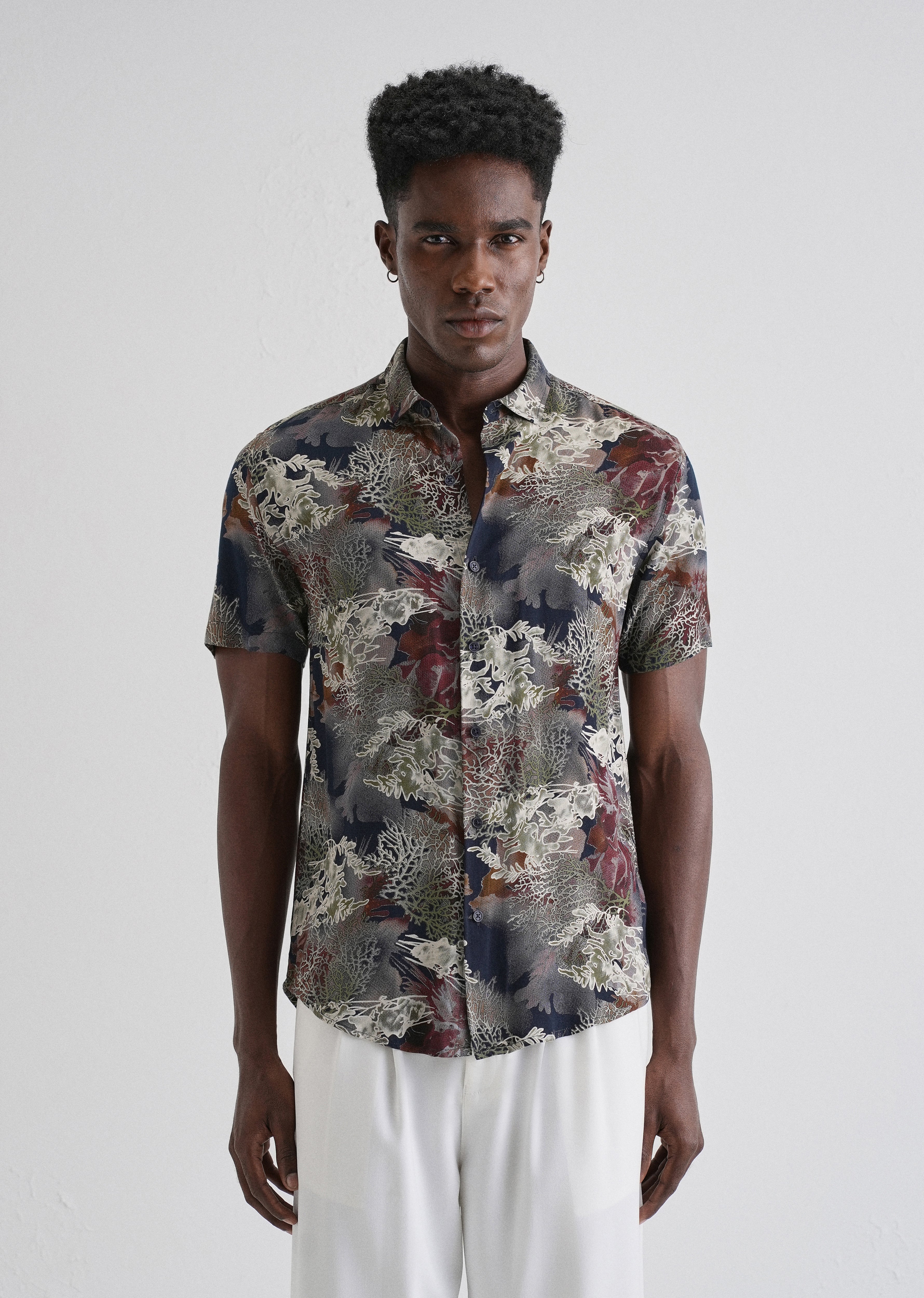 Coral Oasis Blue Feather shirt