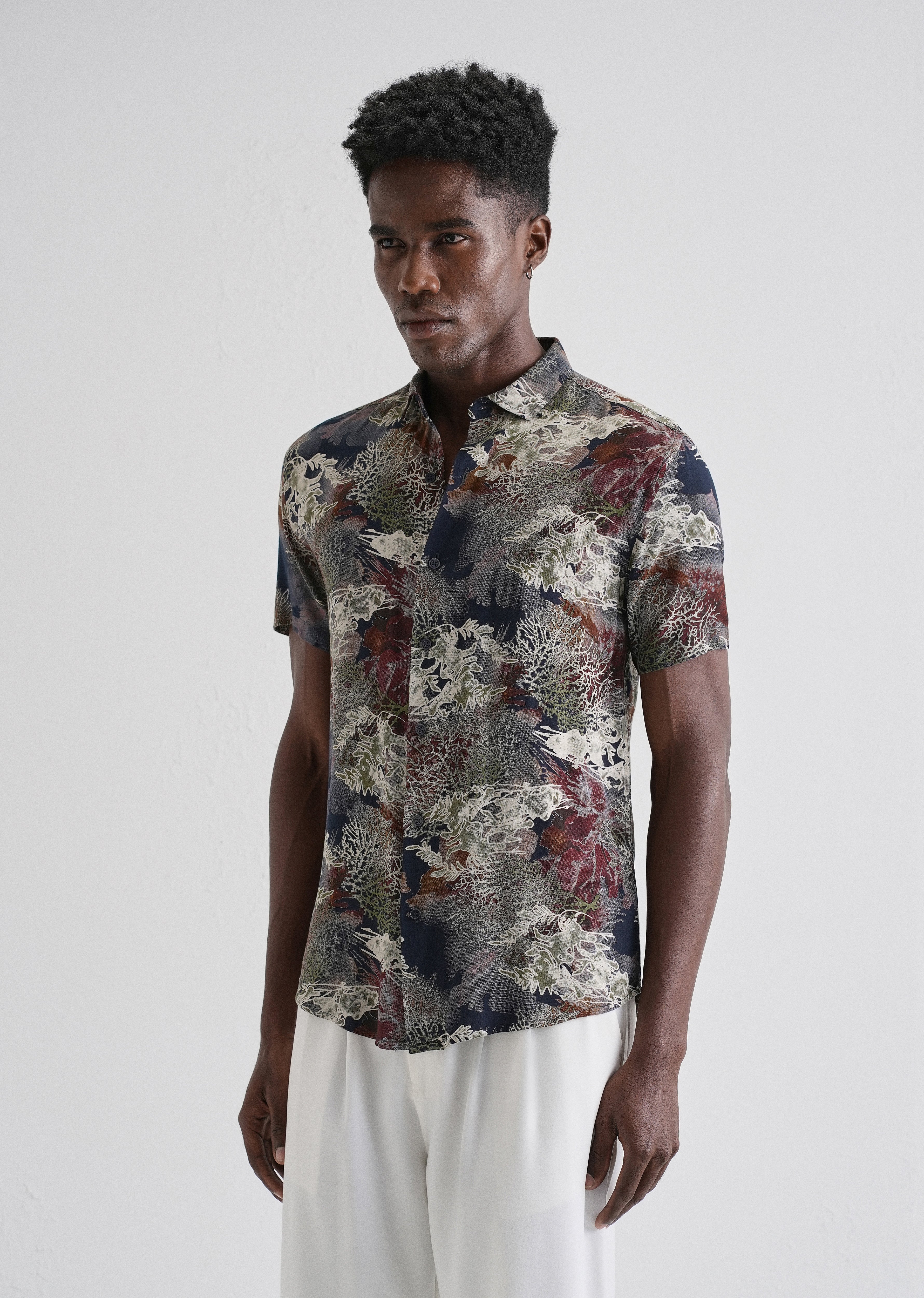 Coral Oasis Blue Feather shirt