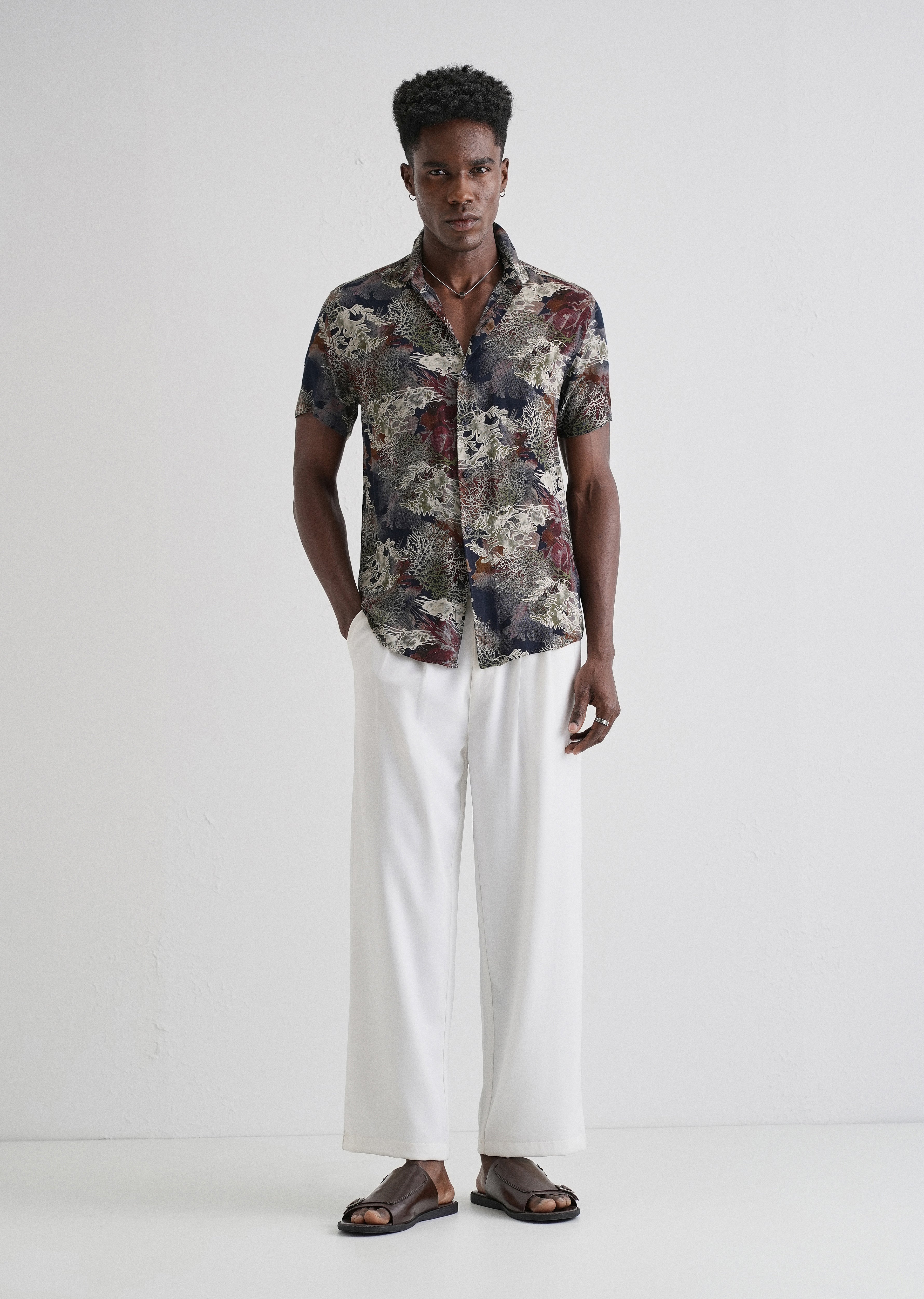 Coral Oasis Blue Feather shirt