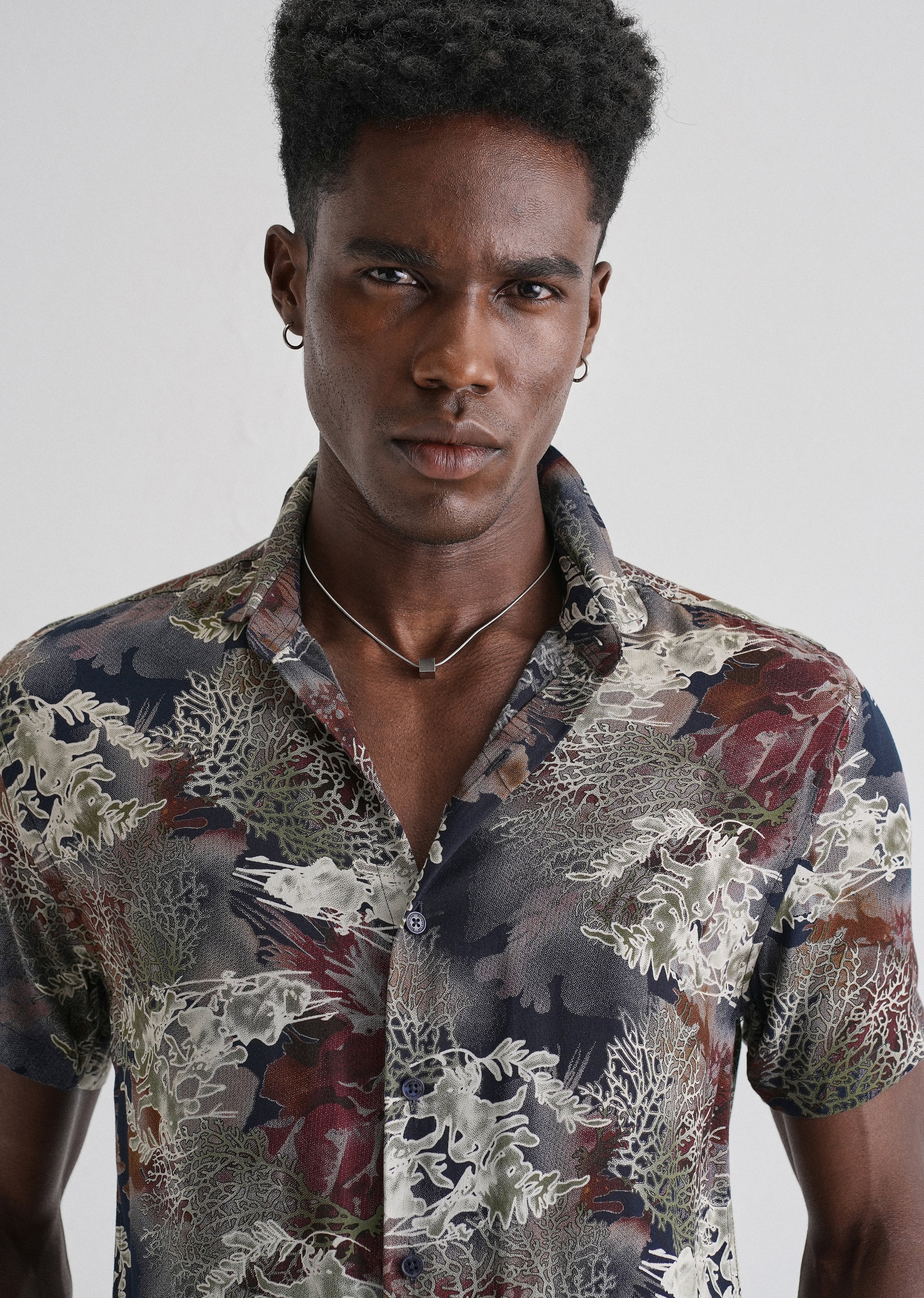 Coral Oasis Blue Feather shirt