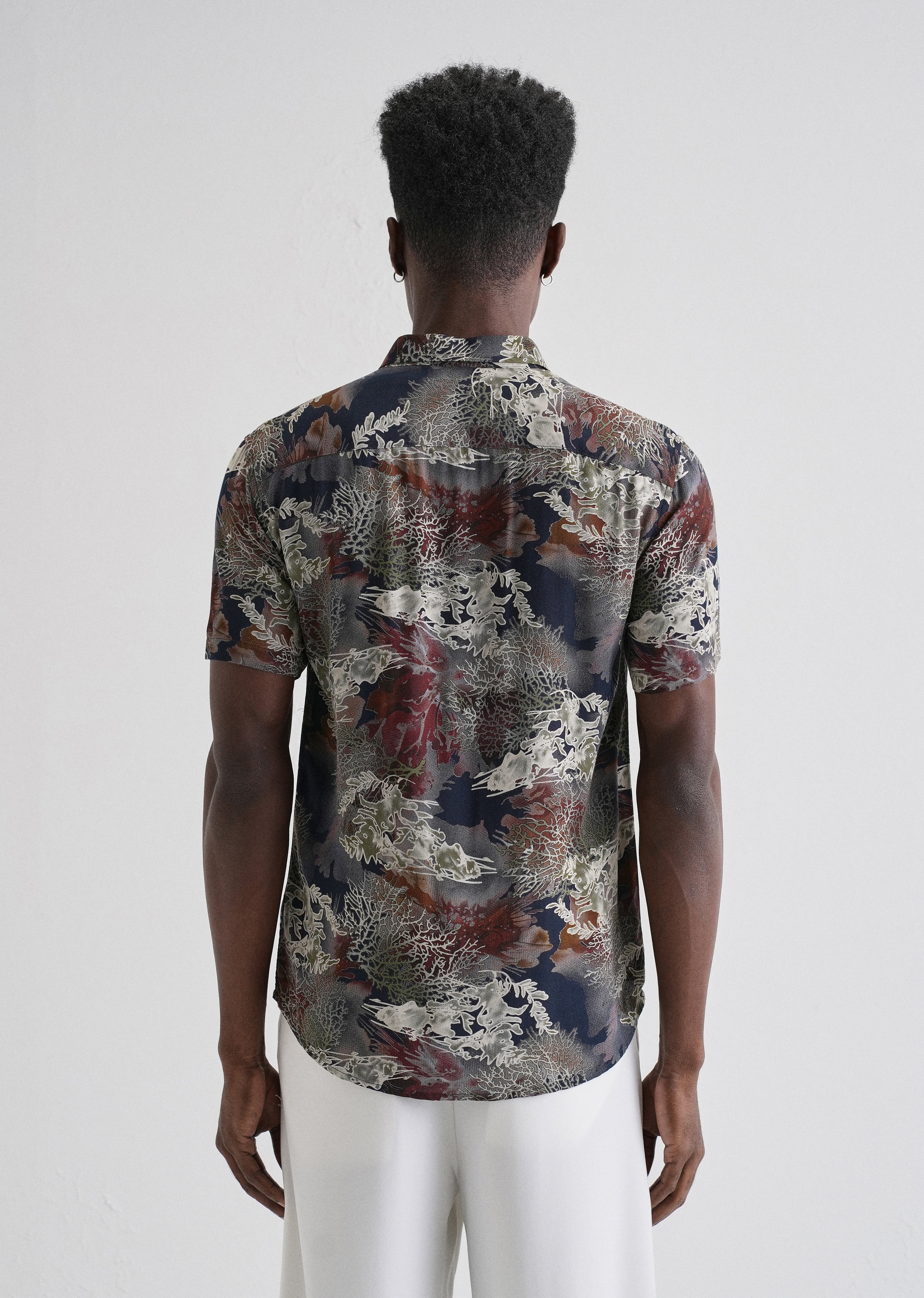 Coral Oasis Blue Feather shirt