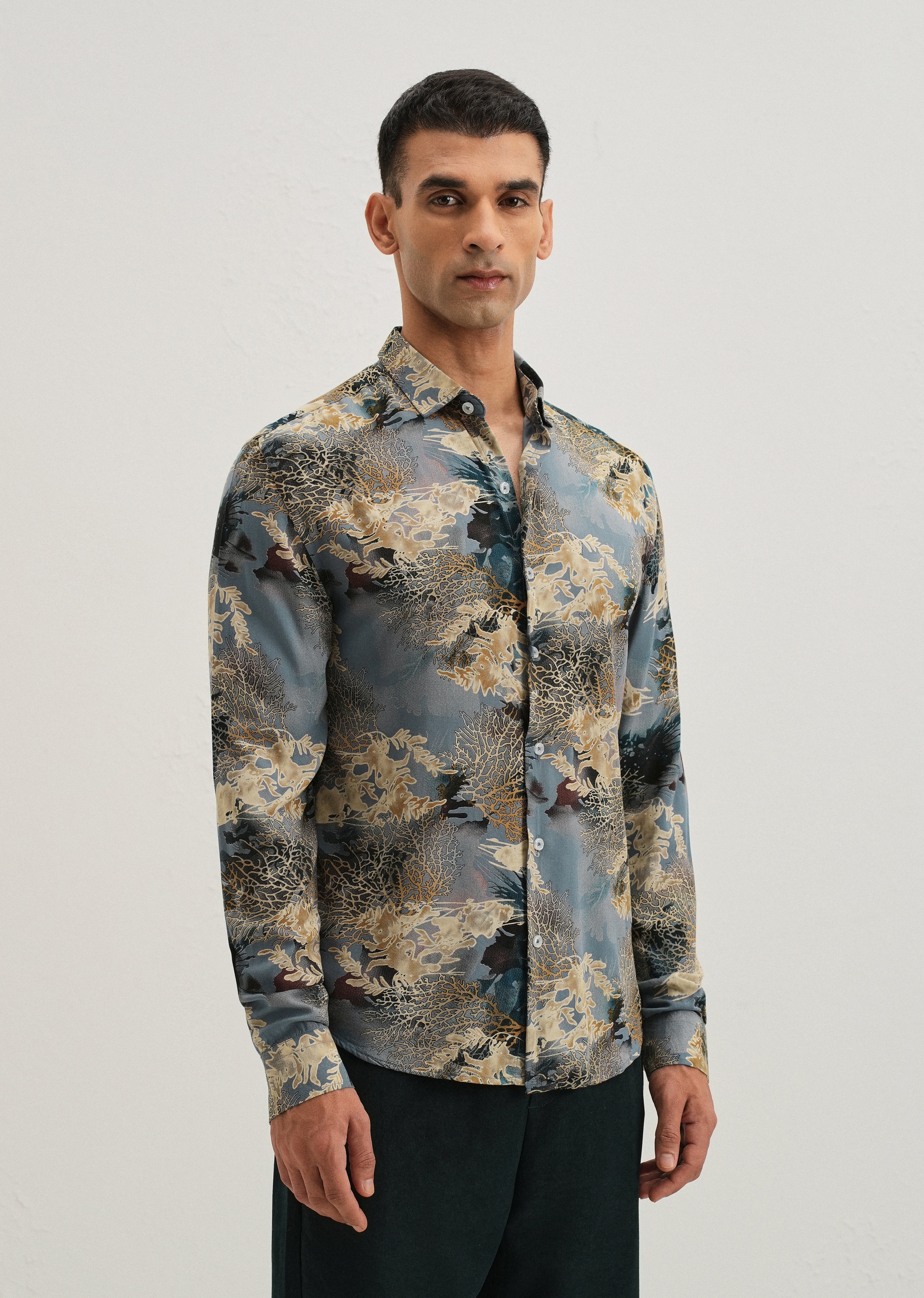 Coral Oasis Light Blue Feather shirt