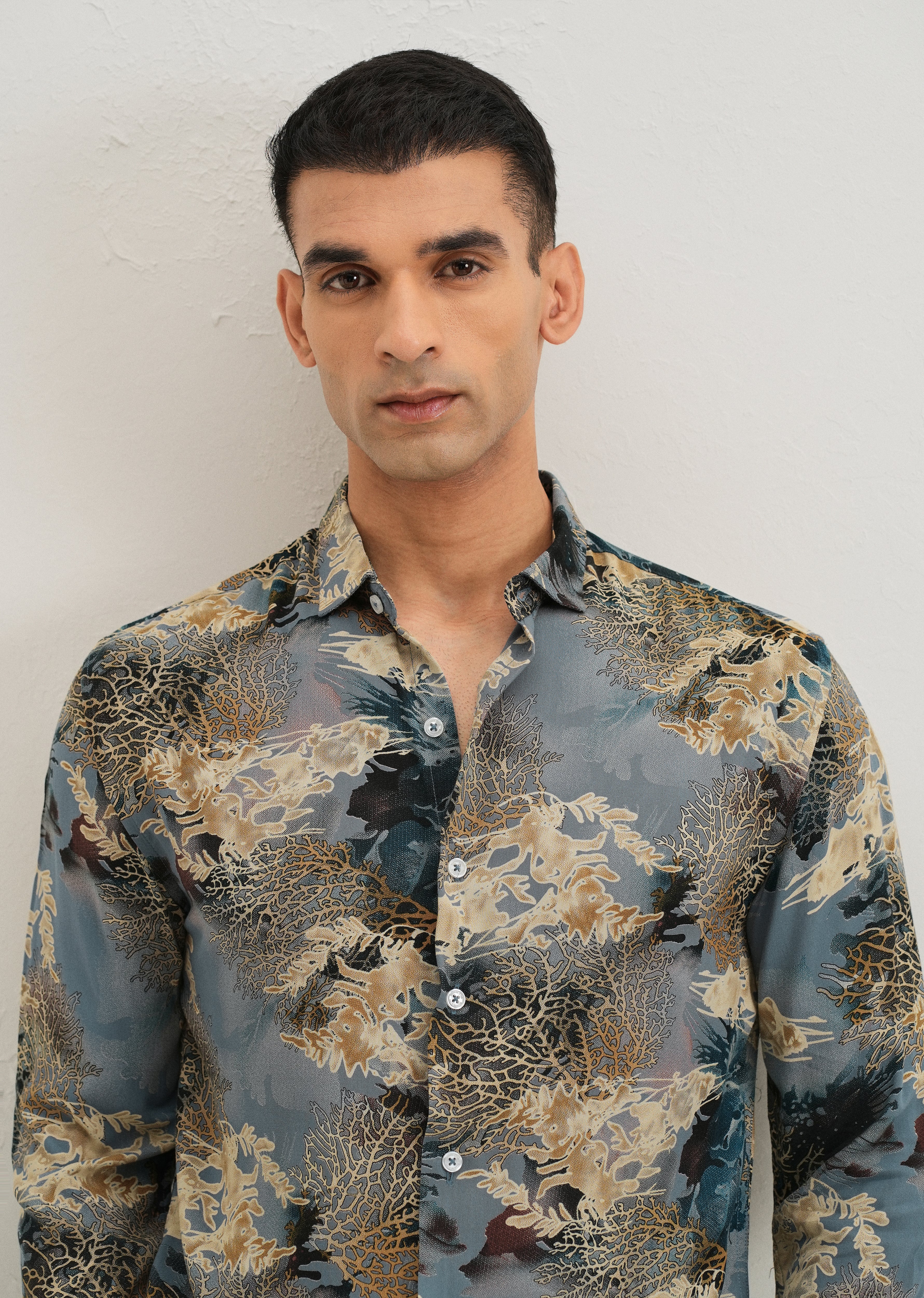 Coral Oasis Light Blue Feather shirt