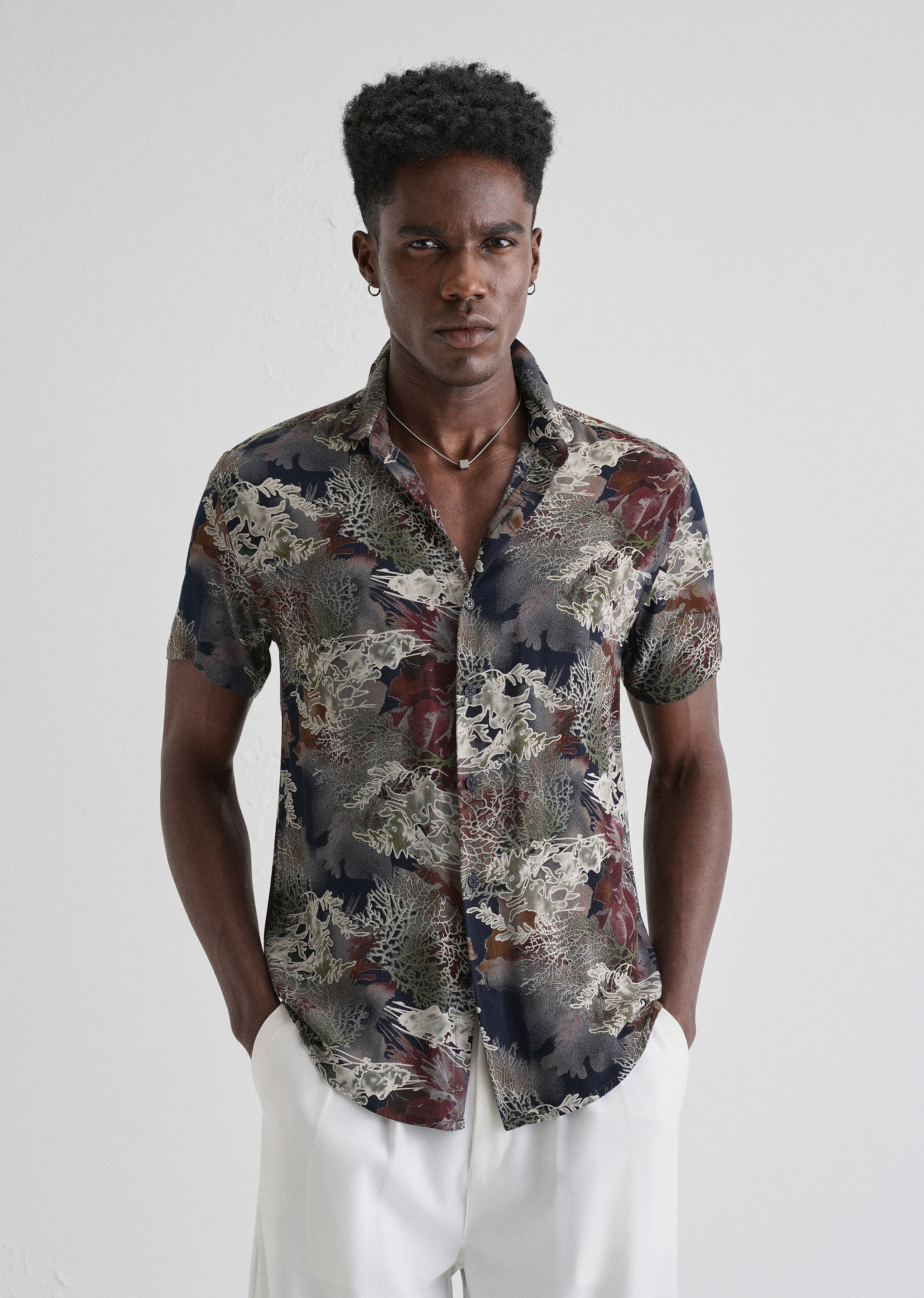 Coral Oasis Blue Feather shirt