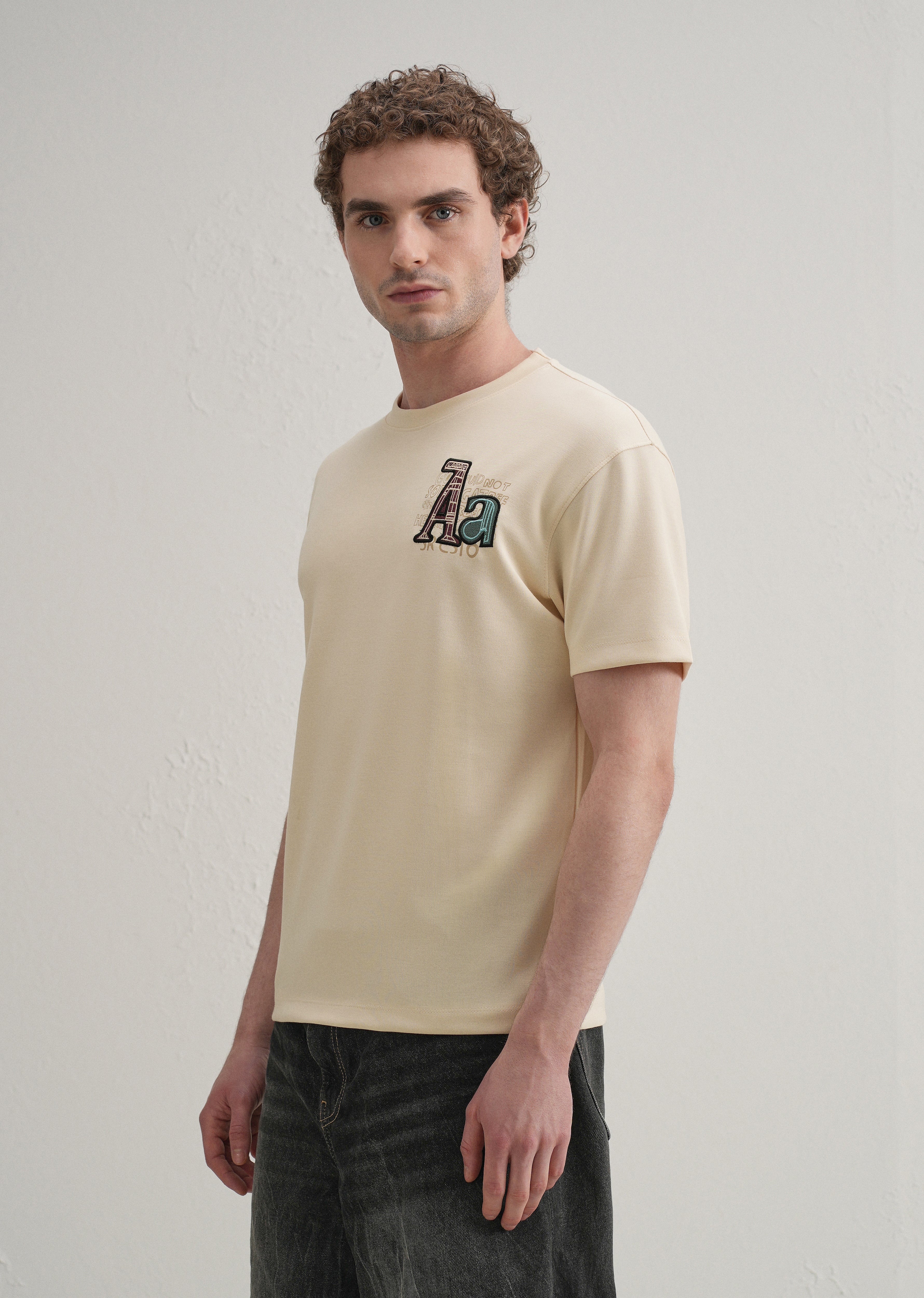 Cream Typography Printed T-shirt