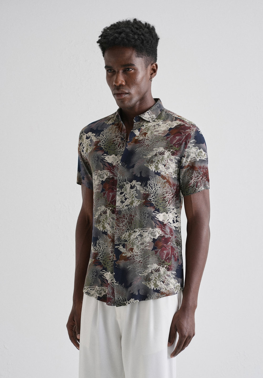 Coral Oasis Blue Feather shirt