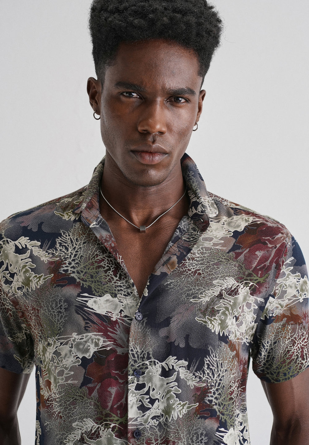 Coral Oasis Blue Feather shirt
