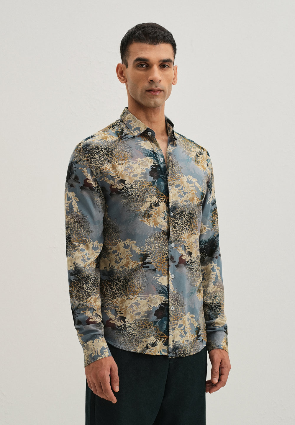 Coral Oasis Light Blue Feather shirt