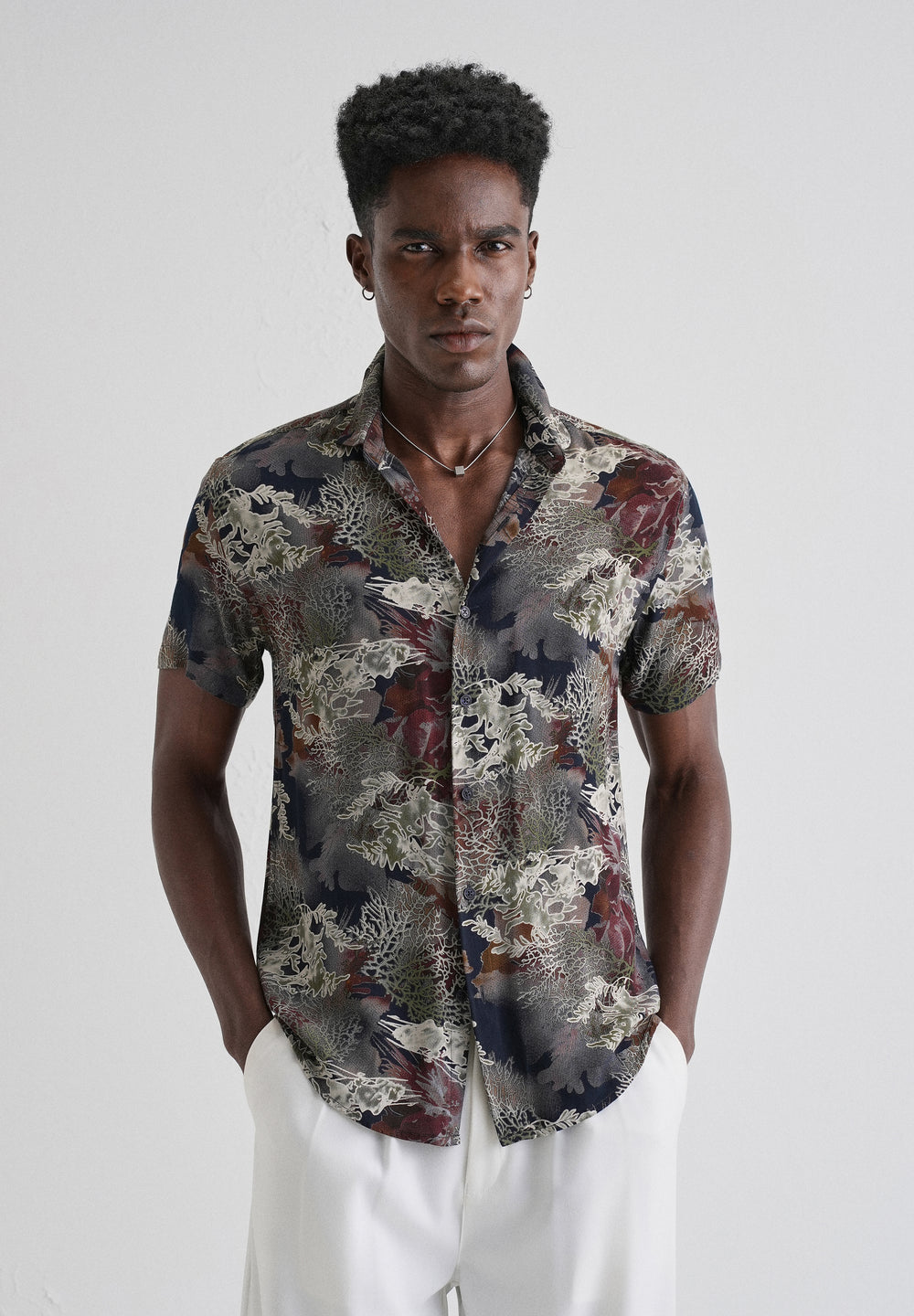 Coral Oasis Blue Feather shirt