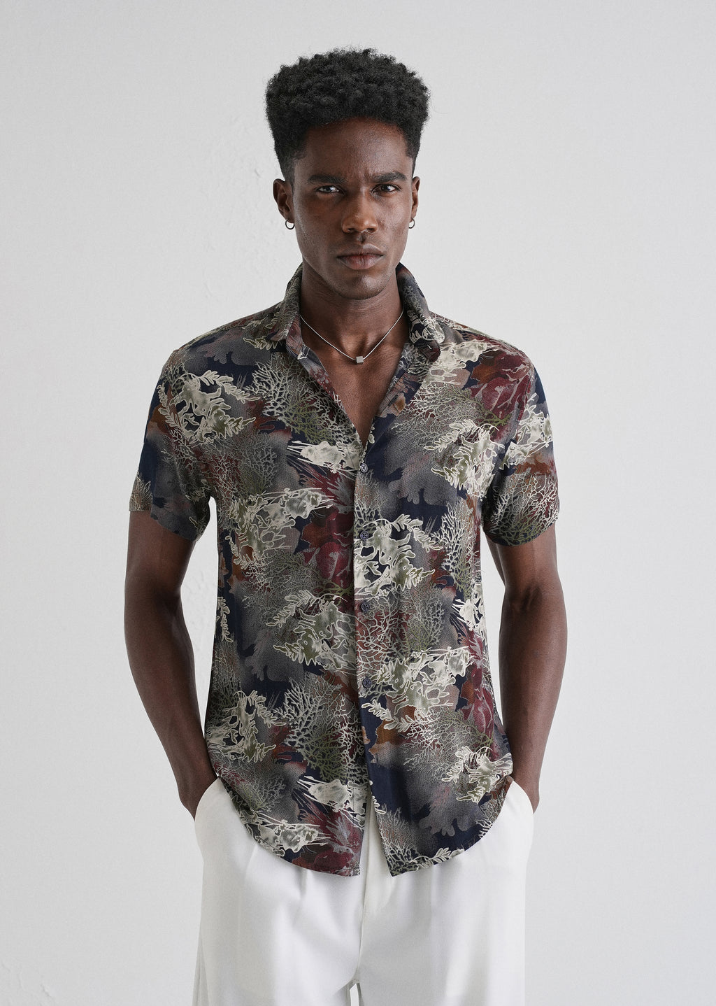 Coral Oasis Blue Feather shirt