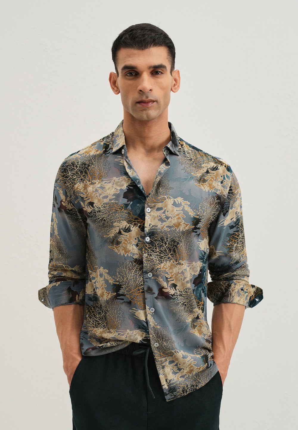 Coral Oasis Light Blue Feather shirt