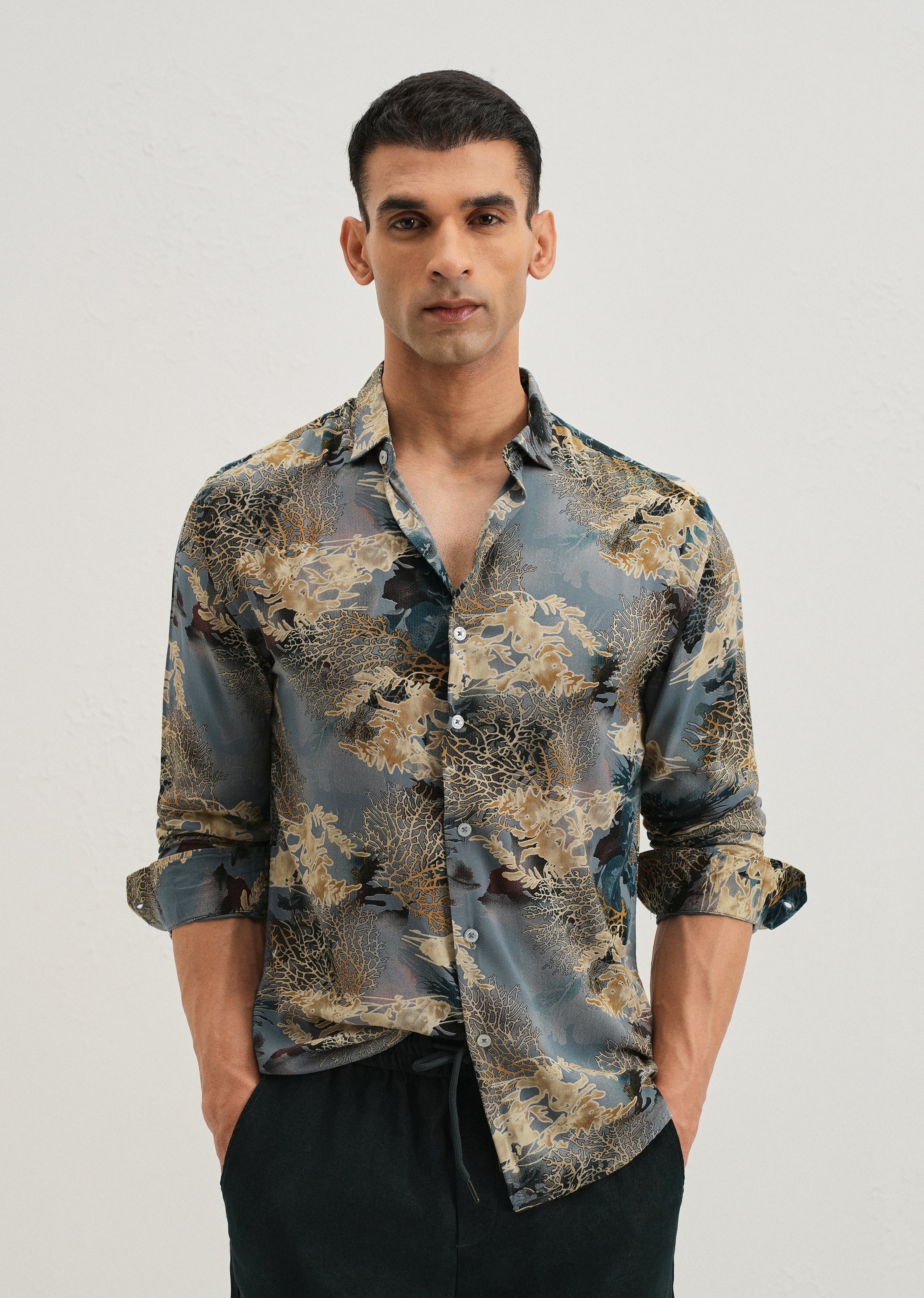 Coral Oasis Light Blue Feather shirt