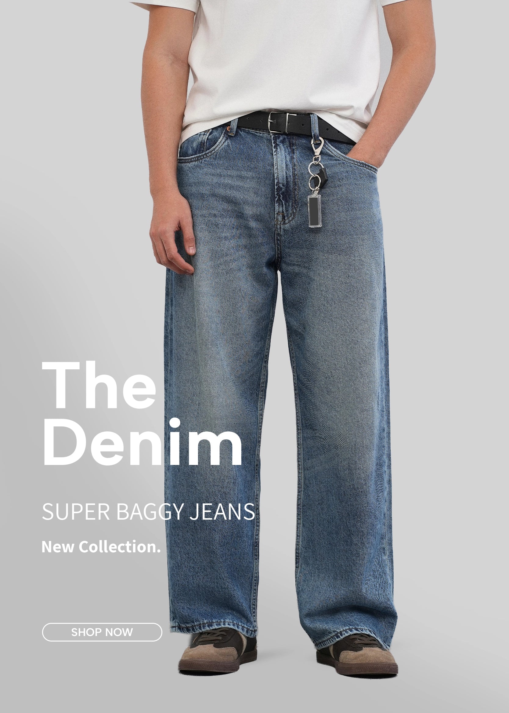 Person wearing super baggy jeans with promotional text on a gray background