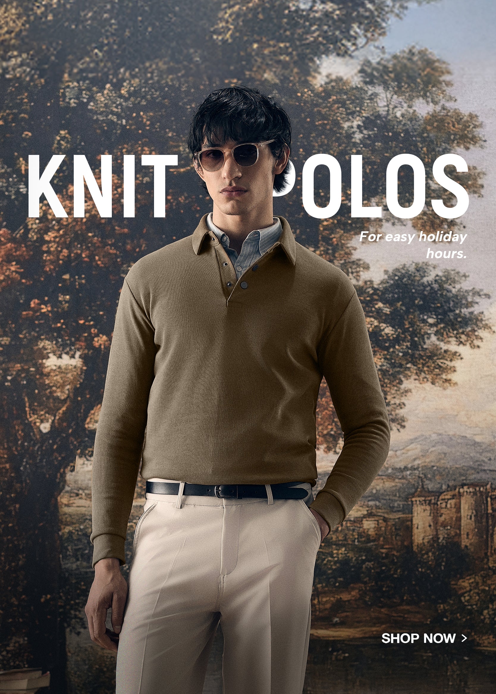 Man wearing a brown knit polo shirt with sunglasses, standing in front of a scenic background.