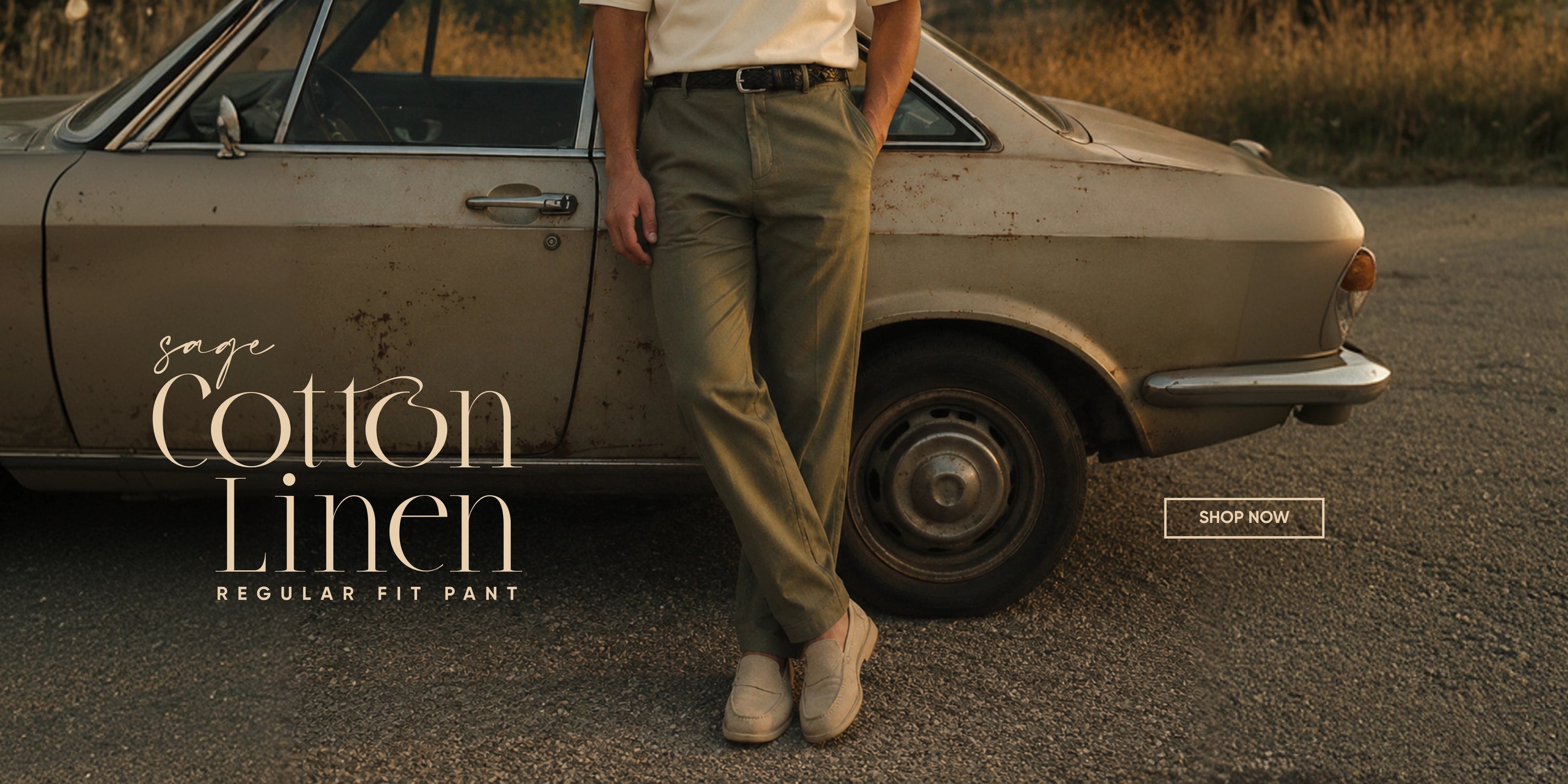 Person wearing a pair of cotton linen pants standing next to an old car with 'Cotton Linen' branding.