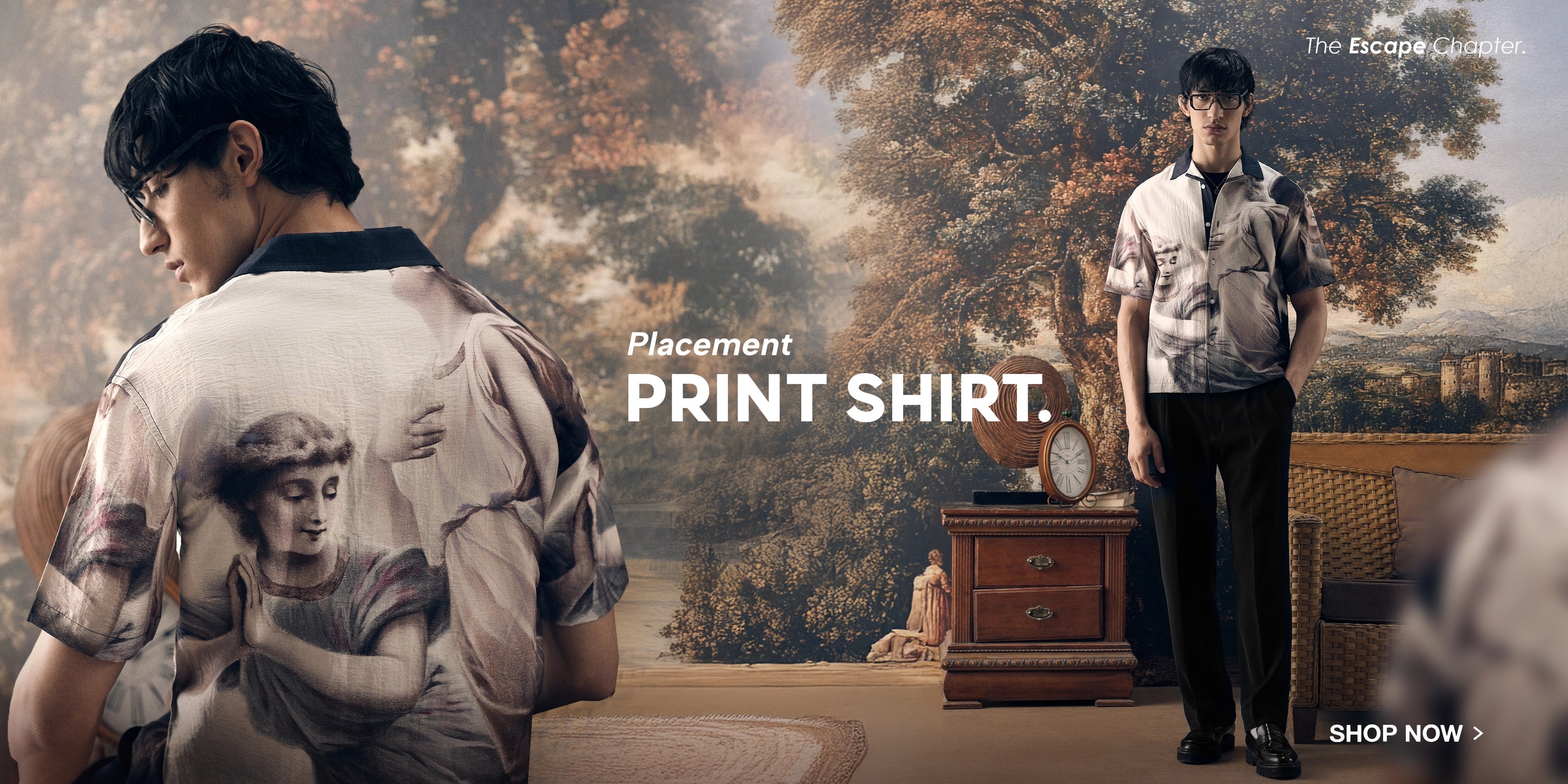 Man wearing a print shirt in a room with classical painting decor