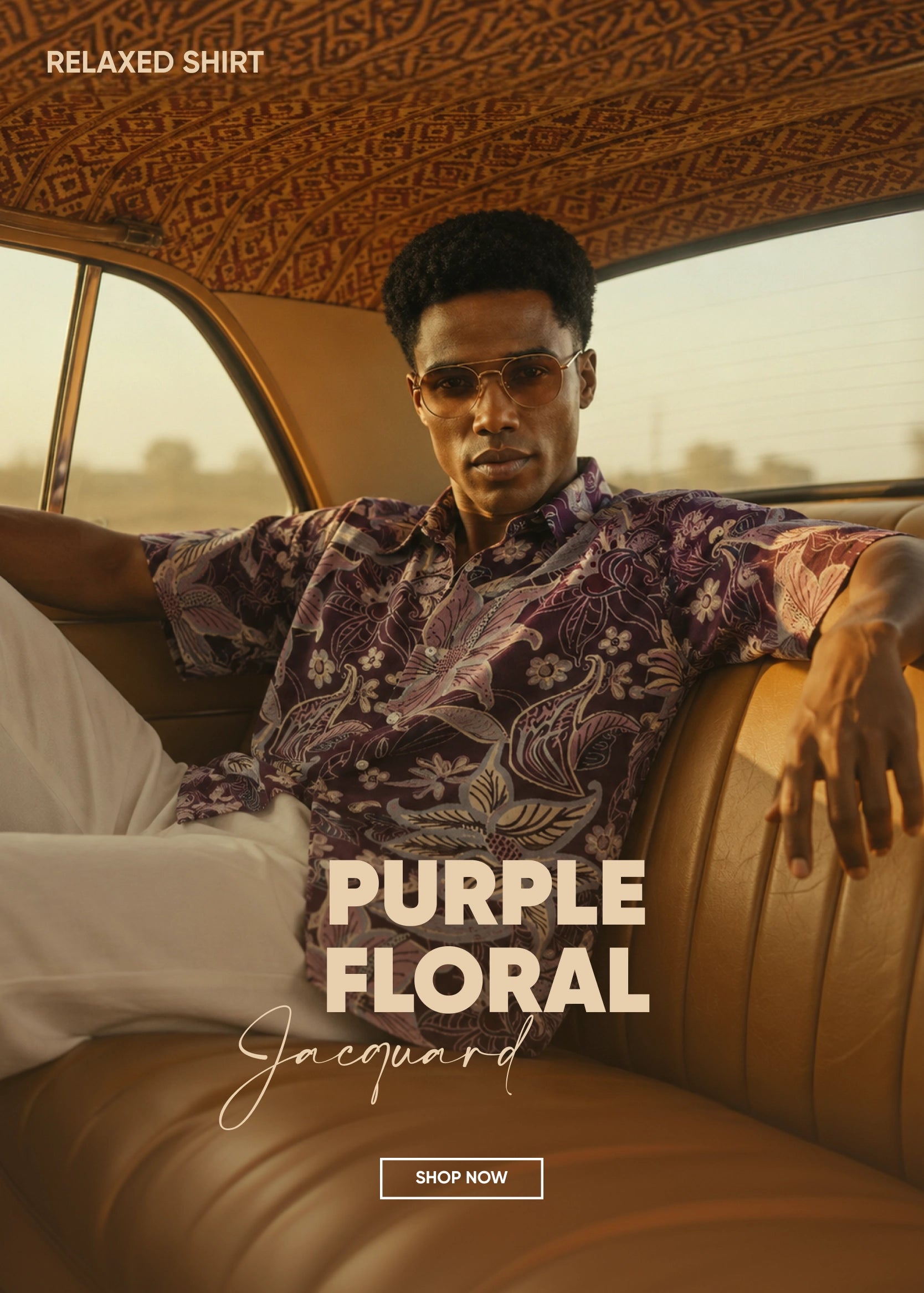 Man wearing a purple floral shirt sitting inside a vintage car with promotional text overlay.